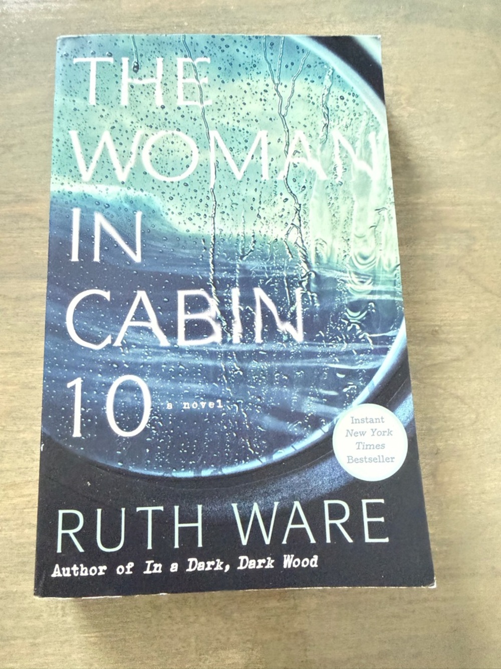 The Woman in Cabin 10 by Ruth Ware - Teal & Navy Paperback